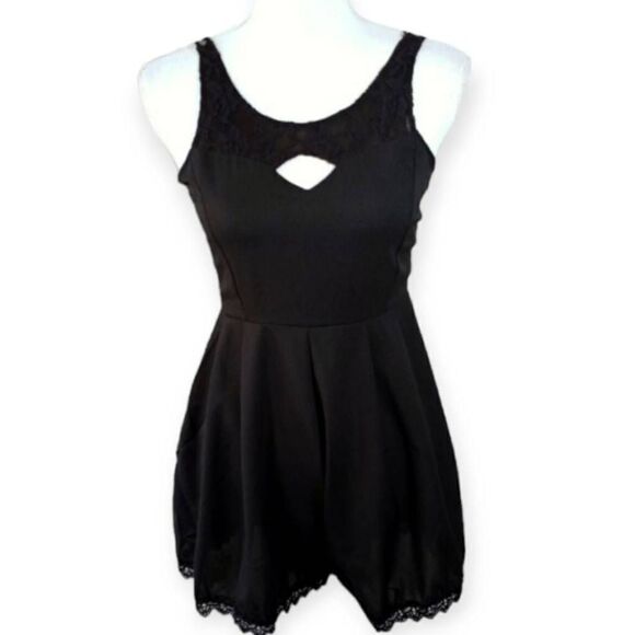 BLACK ROMPER SZ.S IN EXCELLENT USED CONDITION - Picture 1 of 4